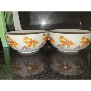 2 white floral ceramic bowls